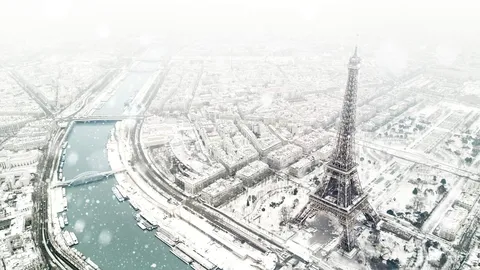 Flocons sur la Ville Lumi&egrave;re